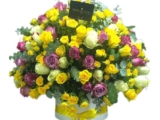 Yellow, White & Purple roses in Round Box