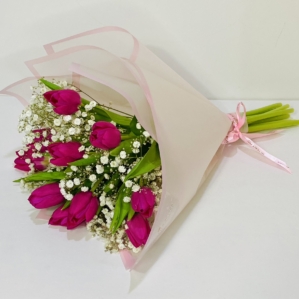 Pink Tulips & Gypso hand bouquet in pink wrapper