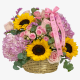 Baby girl flower basket with sunflowers, pink roses, and hydrangeas – same-day delivery in Dubai