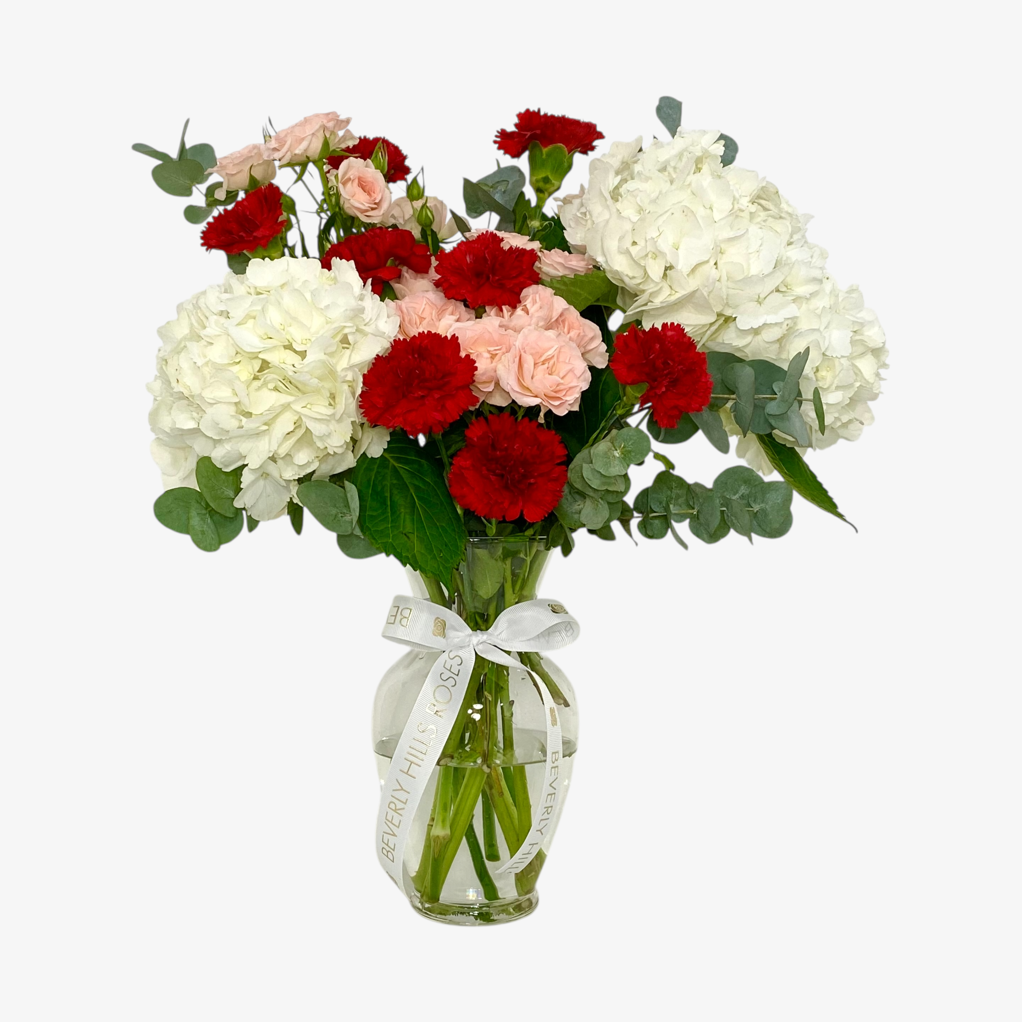 Hydrangea rose carnation vase arrangement with same-day flower delivery in Dubai UAE