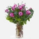 purple roses in clear glass vase arrangement Dubai