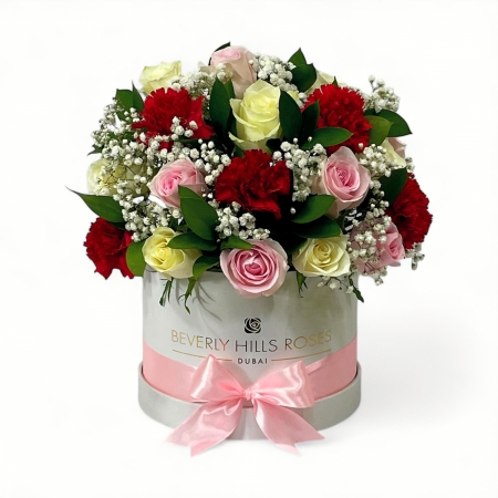 Baby pink roses, white roses, and red carnations luxury box arrangement for delivery in Palm Jumeirah, JVC, Dubai Marina, Downtown Dubai, Al Barsha