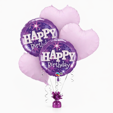 Purple sparkle birthday balloon bouquet with foil “Happy Birthday” balloons and soft purple heart helium balloons.